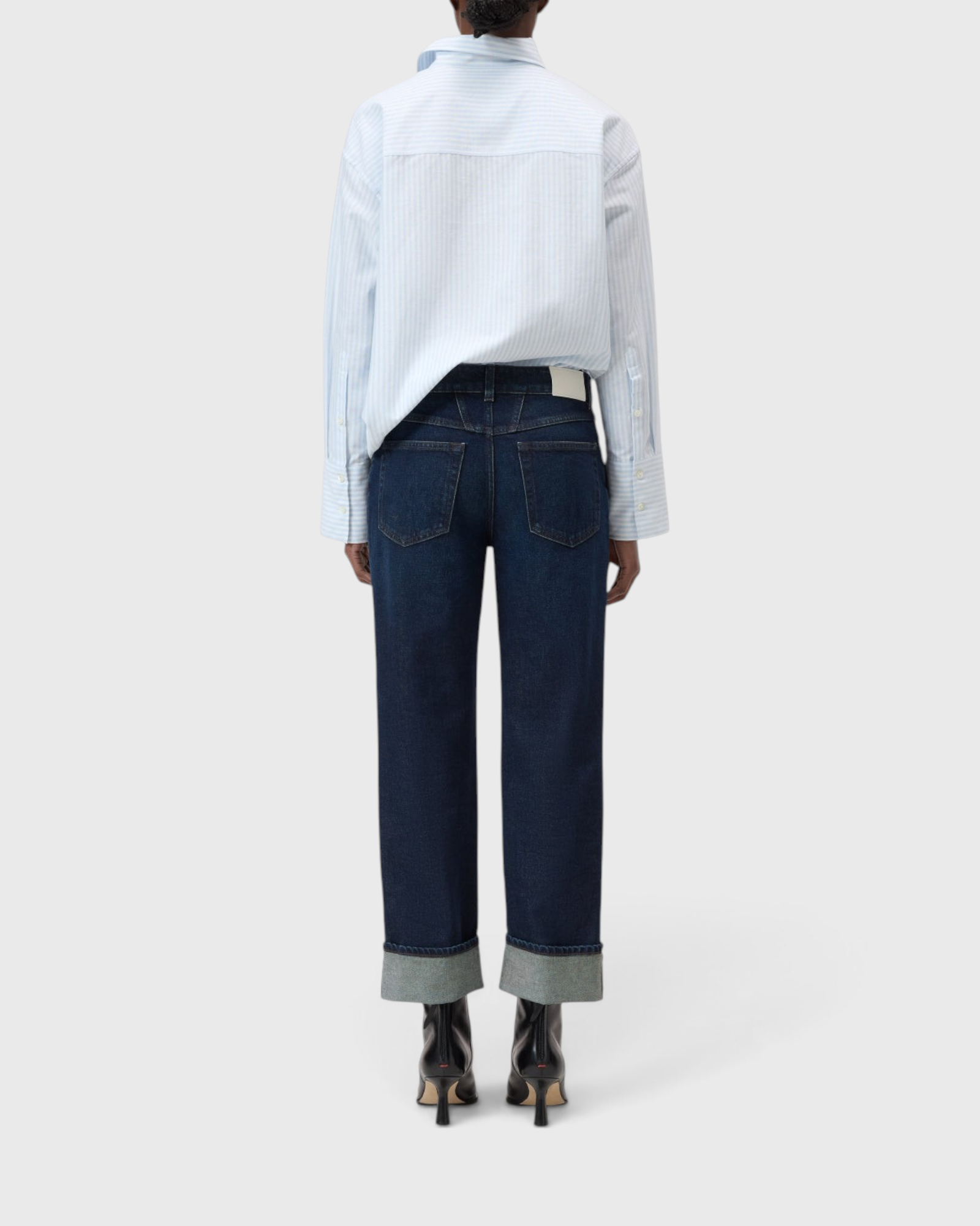 JONES + CO Milo dark blue stretch denim jeans with a mid-rise waist, straight cropped leg, and rolled-up hems.