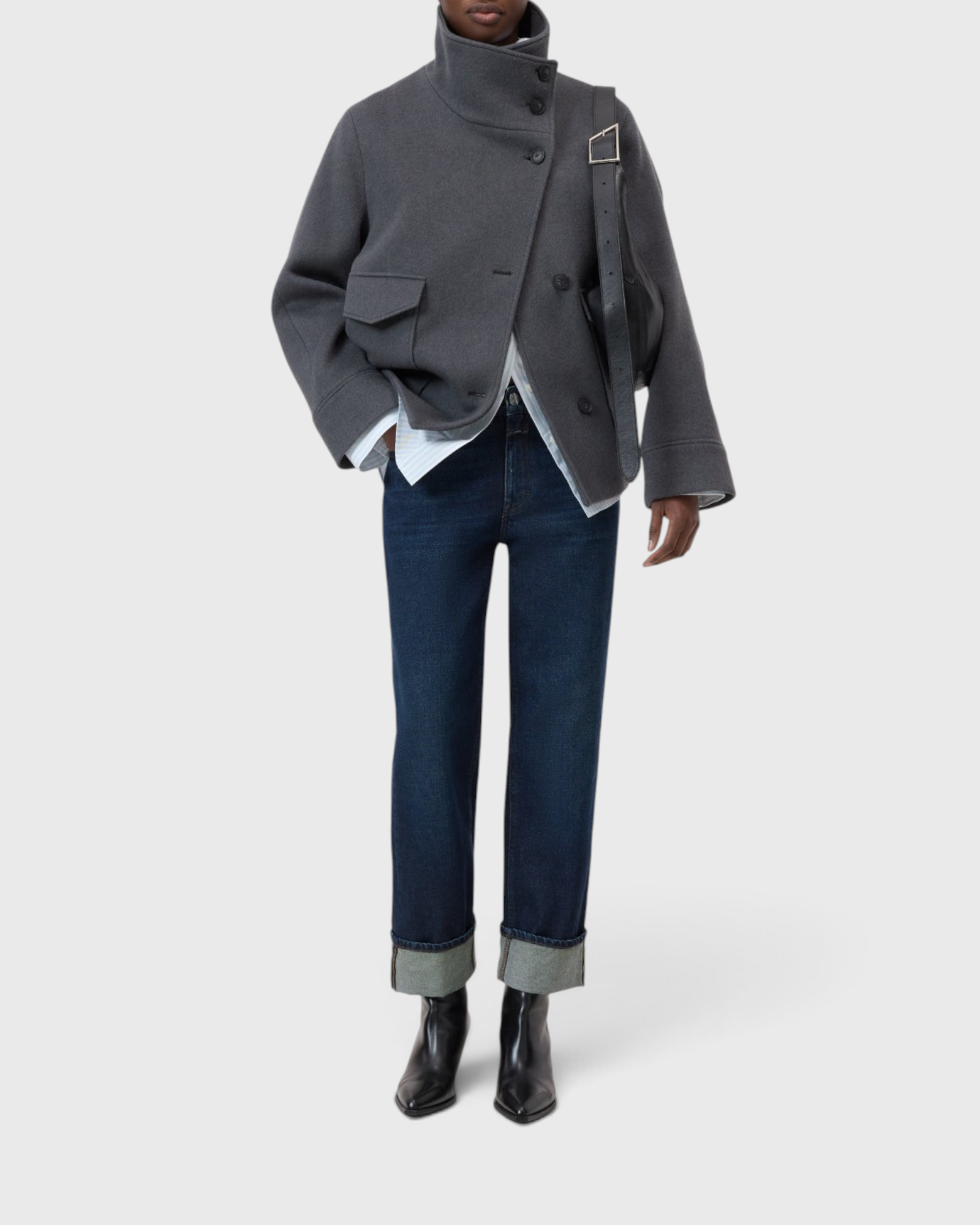 JONES + CO Milo dark blue denim jeans with a mid-rise waist, straight cropped leg, and rolled-up hems.