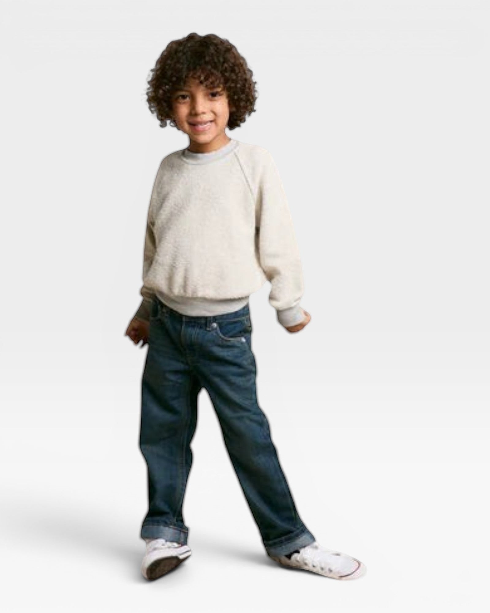 JONES + CO Mini Ziggy sweatshirt in heather grey soft cotton fleece worn by a child with curly hair