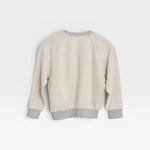 JONES + CO Mini Ziggy sweatshirt in heather grey soft cotton fleece with a textured inside-out heritage design