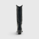 JONES + CO Monty black leather knee-high boot with curved shaft, pull tabs, and angled block heel, back view.