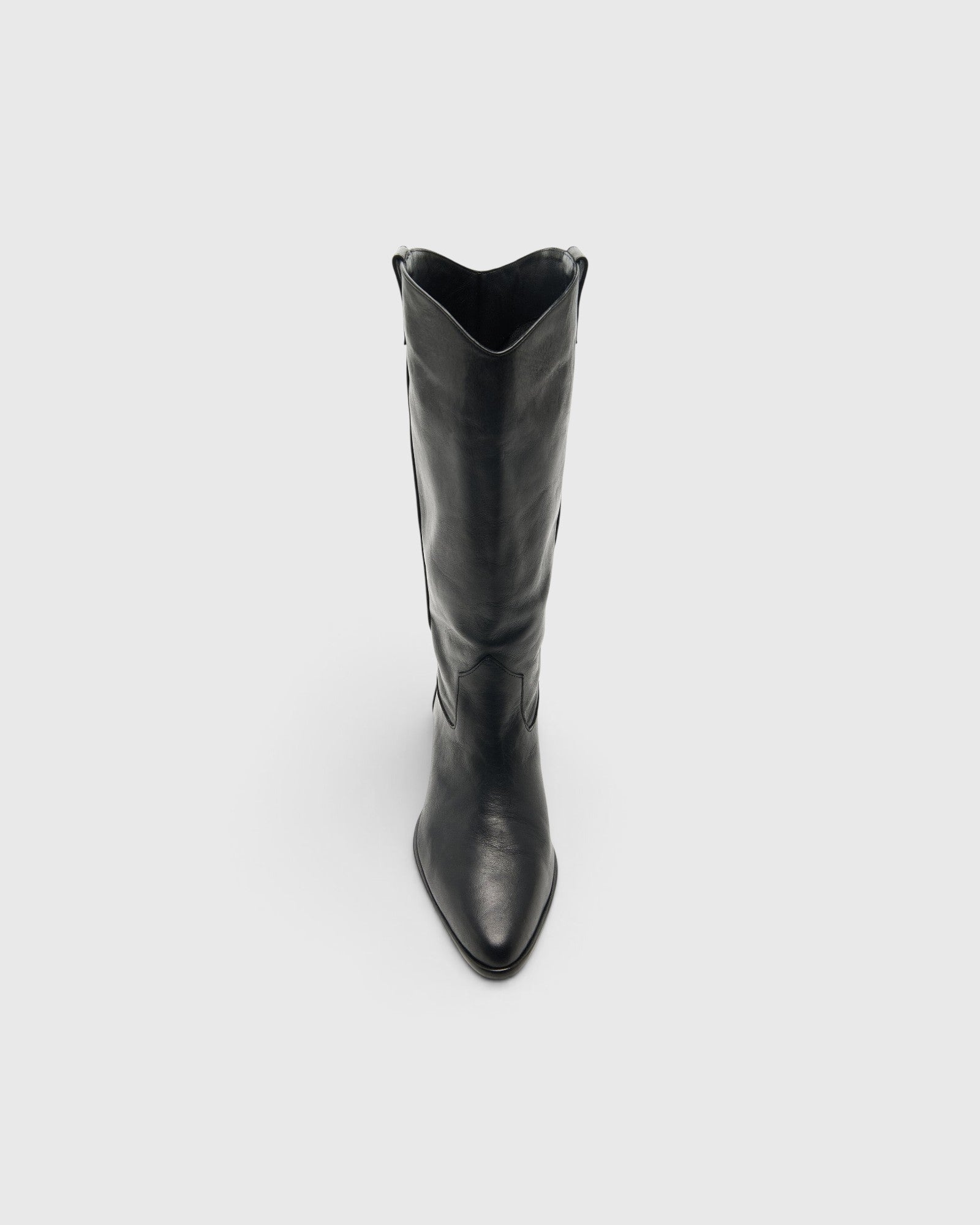 JONES + CO Monty black leather knee-high boot with a curved shaft, pointed toe, and pull tabs, front view.