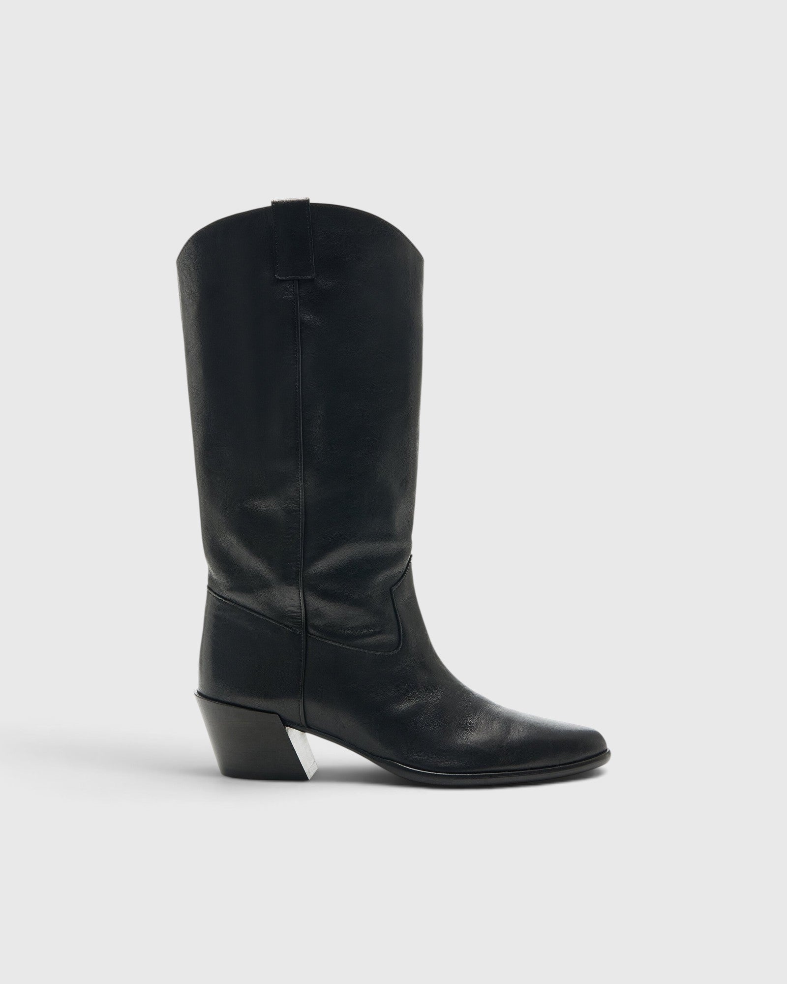 JONES + CO Monty black leather knee-high boot with a curved shaft, pull tabs, pointed toe, and angled block heel.