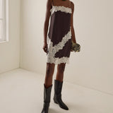 JONES + CO Monty Boot in black leather with a pointed toe, angled block heel, and pull tabs for a sleek fit.