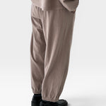 JONES + CO mushroom brown balloon pants with elastic waist and leg openings, side pockets.