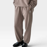 JONES + CO mushroom brown knit balloon pants with elastic waist and leg opening, side pockets.