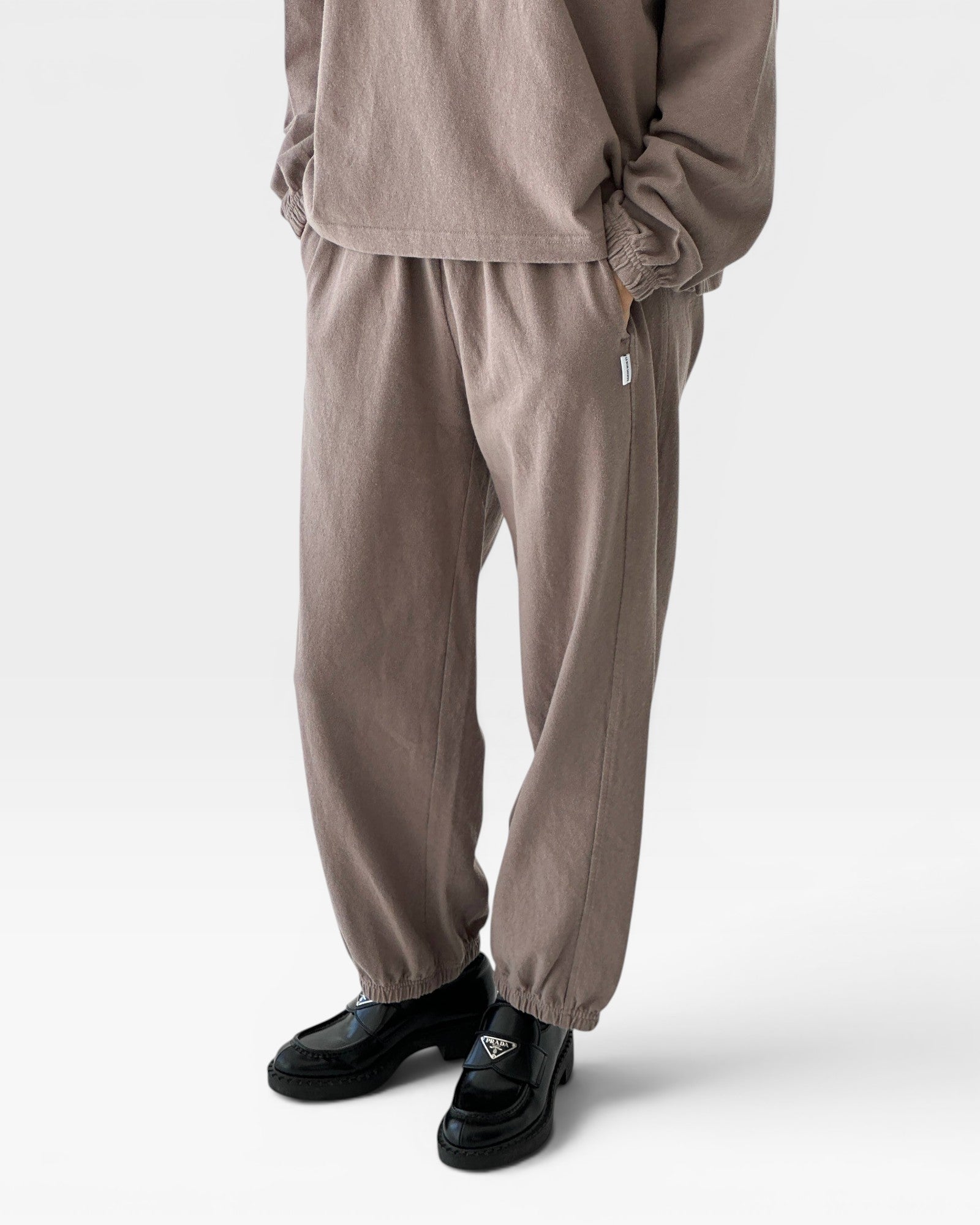 JONES + CO mushroom brown knit balloon pants with elastic waist and leg opening, side pockets.