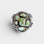 JONES + CO Navajo vintage sterling silver cuff bracelet with multiple green turquoise stones.