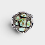 JONES + CO Navajo vintage sterling silver cuff bracelet with multiple green turquoise stones.