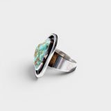 JONES + CO Vintage Navajo oval turquoise ring in sterling silver with unique matrix patterns.