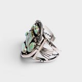 JONES + CO Navajo vintage sterling silver cuff bracelet with green turquoise stones and intricate detailing.