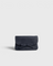 JONES + CO navy blue pebbled leather petite case with a decorative knotted bow and hidden magnetic closure