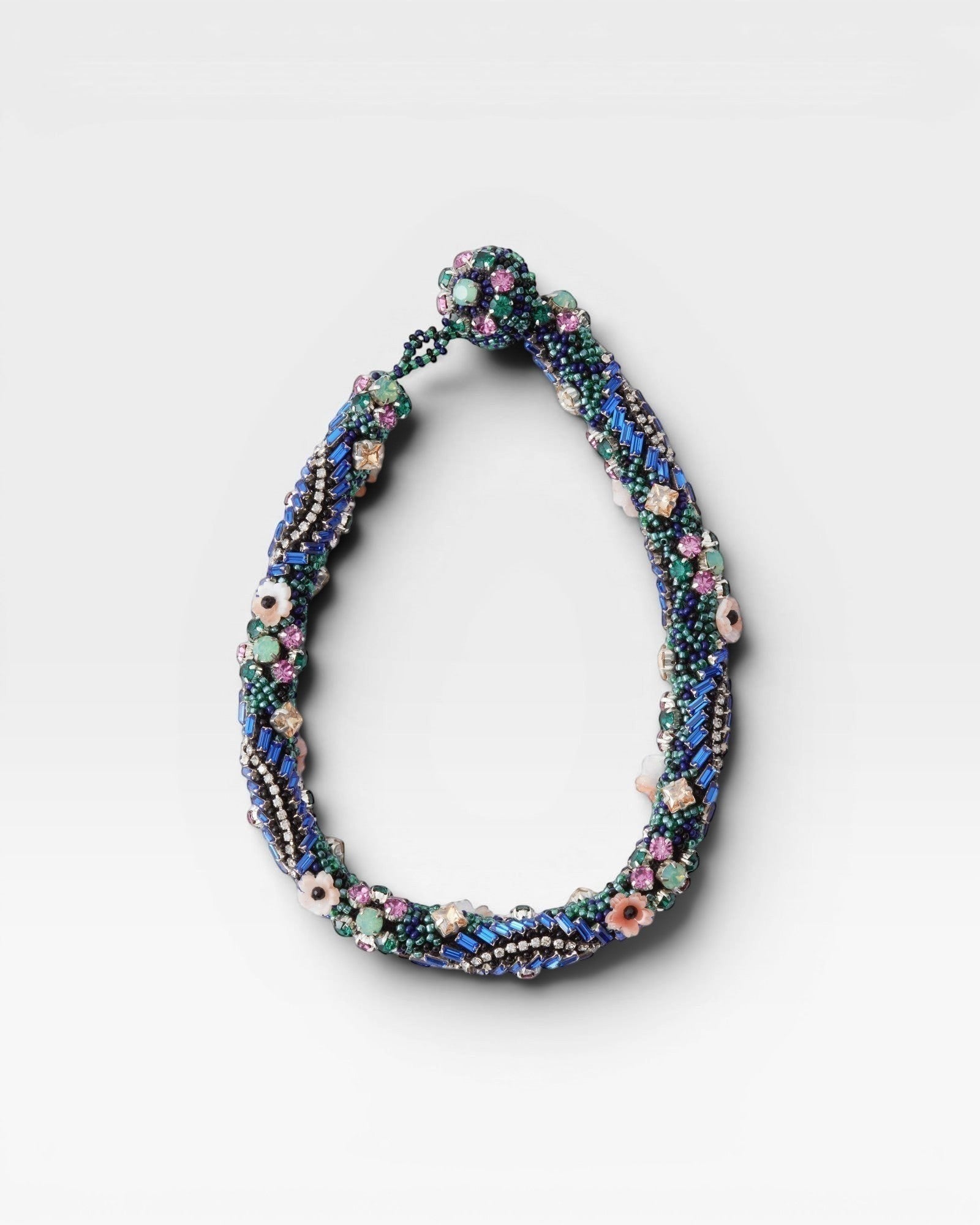 JONES + CO Nerium Necklace with rhinestones, seed beads, floral beads, and adjustable chain. Multi-colored.
