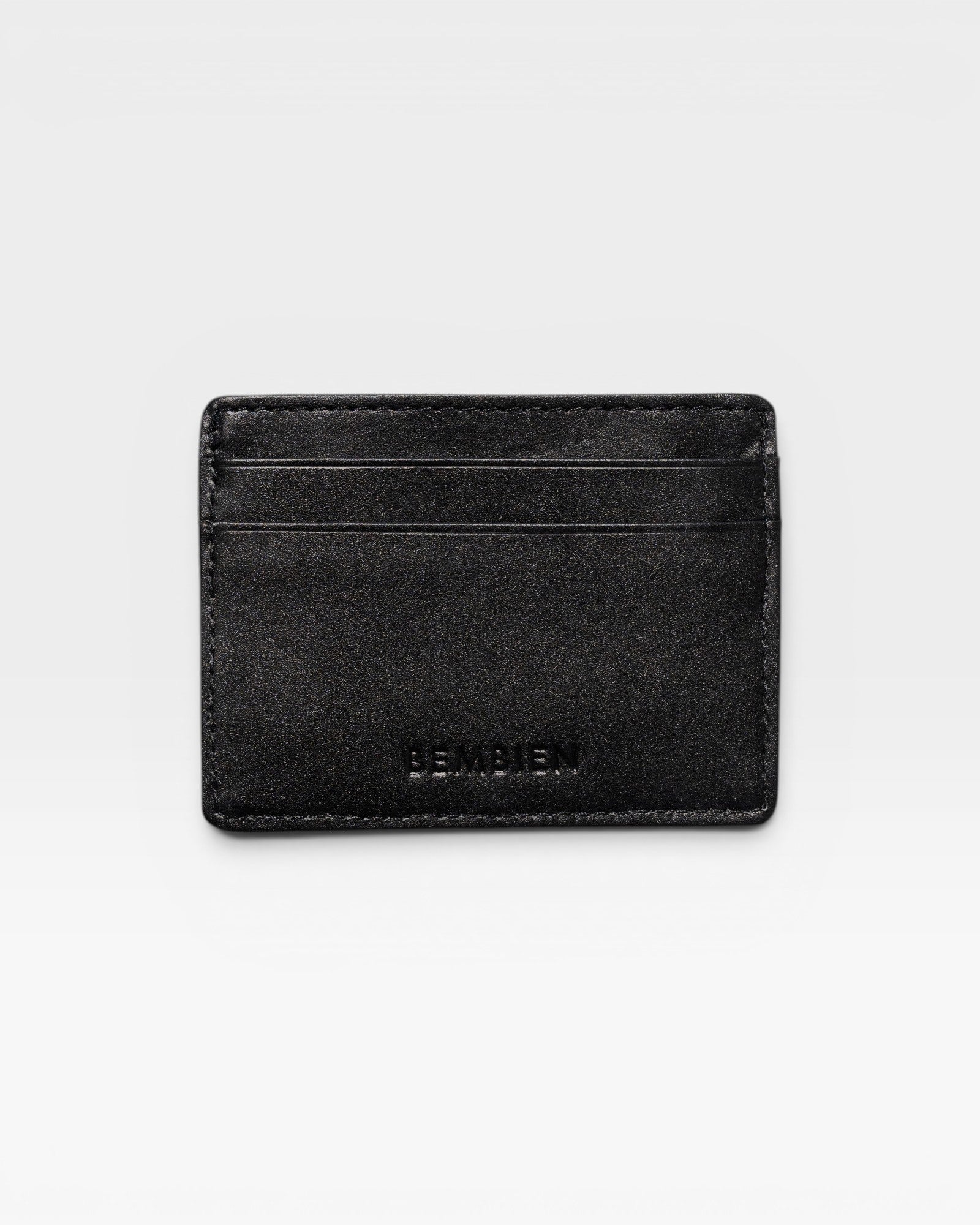 JONES + CO Nico Card Case in black leather with two card slots and a central pocket.