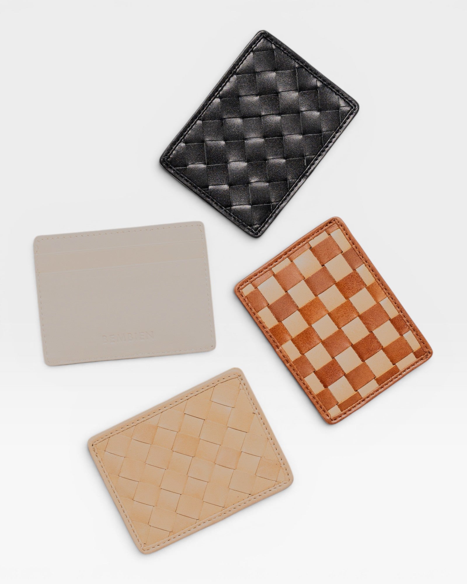 JONES + CO Nico card case in black woven leather, with beige and tan card holders.