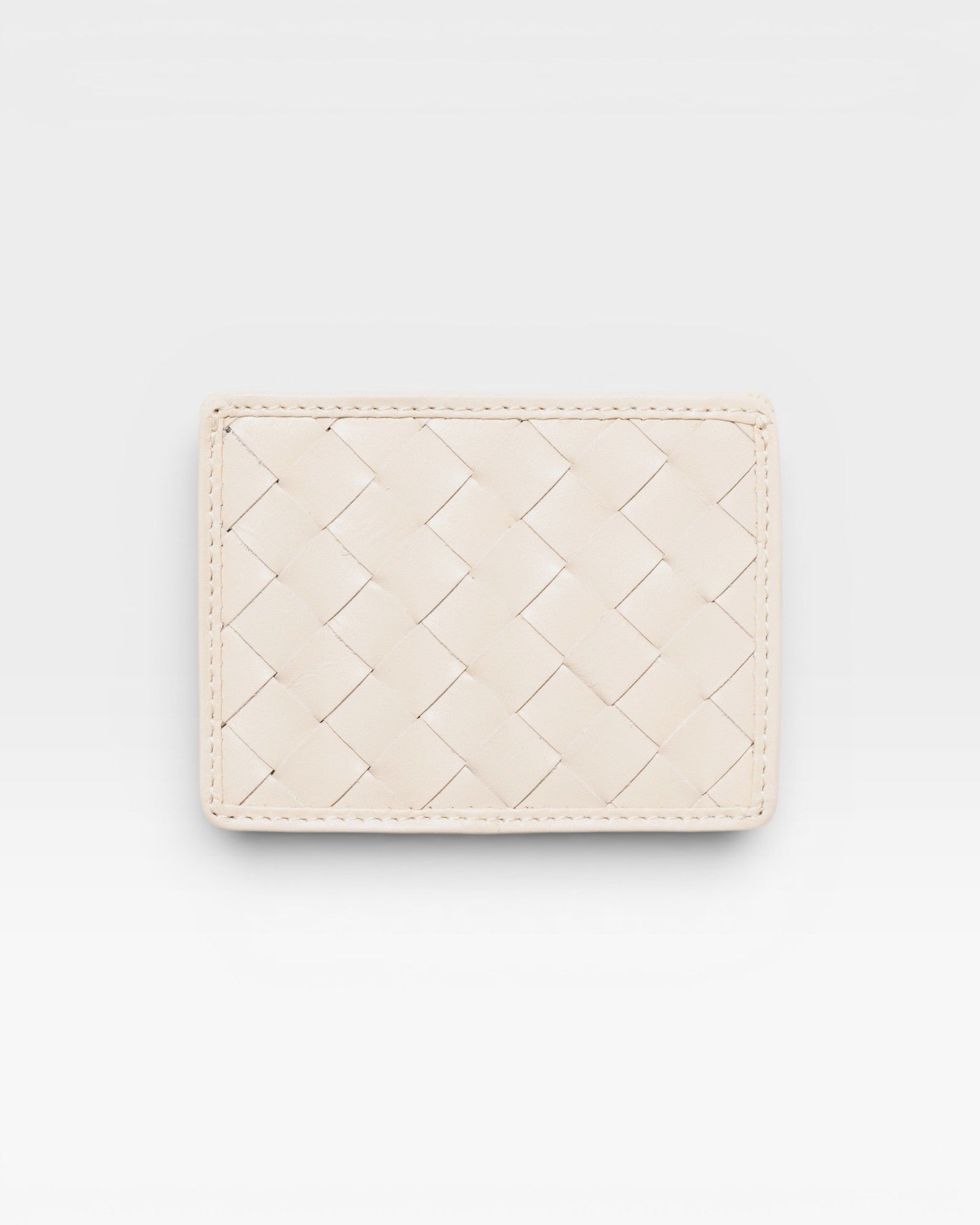 JONES + CO Nico card case in cream woven leather with two card slots and a bill pocket.