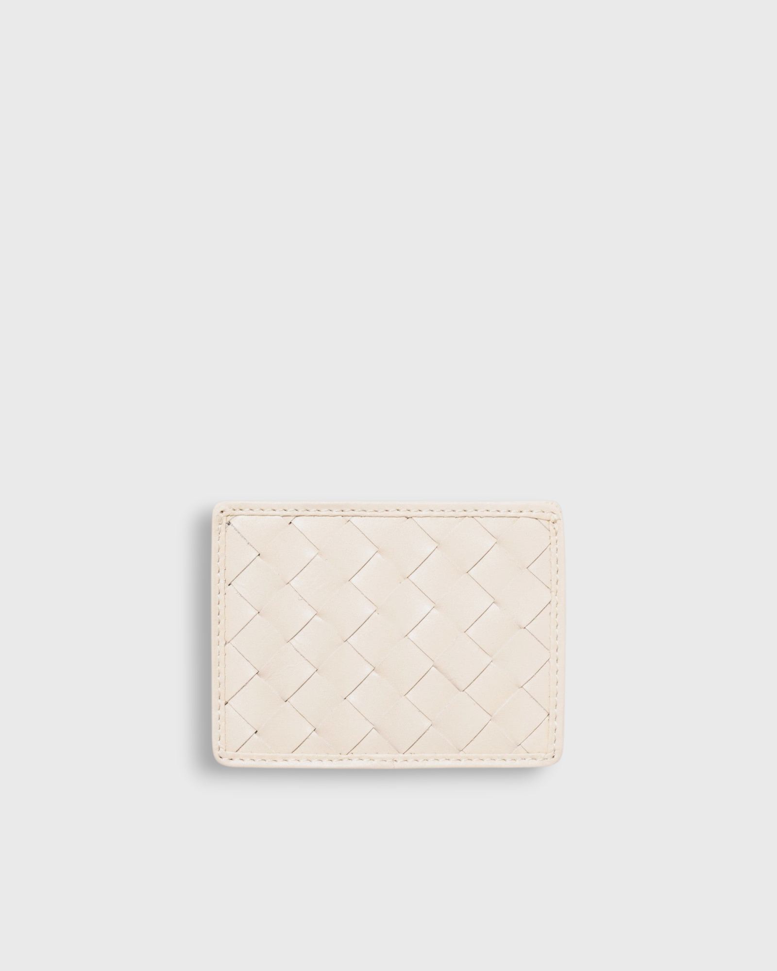 JONES + CO Nico card case in cream woven leather with two card slots and a bill pocket.