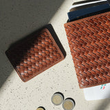 JONES + CO Nico Card Case in sienna handwoven leather with two card slots and a bill pocket. Minimalist design.