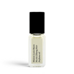 JONES + CO No.03 L'Etang Noir Perfume Oil travel size glass bottle with black cap and cream label.