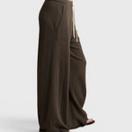 JONES + CO Noa dark olive straight-leg French terry pants with a rope drawstring waist and side pockets, side view