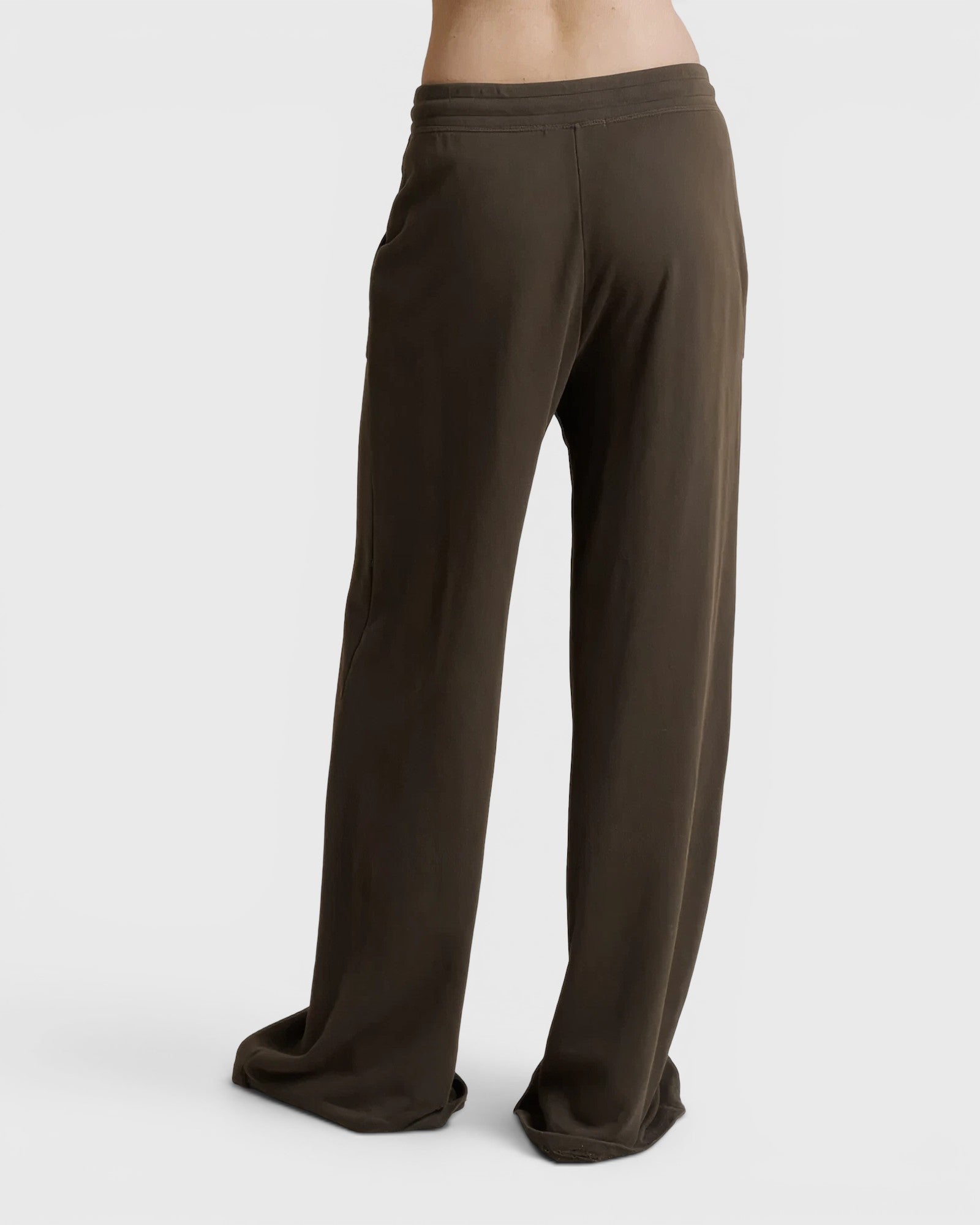 JONES + CO Noa straight-leg french terry pants in dark olive with a drawstring waist, back view.