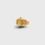 JONES + CO Nocturne Time Ring in 18K gold-plated stainless steel with a rectangular amber crystal face