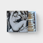 JONES + CO Nue matchbox featuring a black and white artistic nude illustration with white-tipped wooden matches.