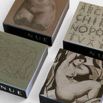 JONES + CO Nue artistic matchboxes featuring classical figure drawings and alphabet illustrations on square boxes.