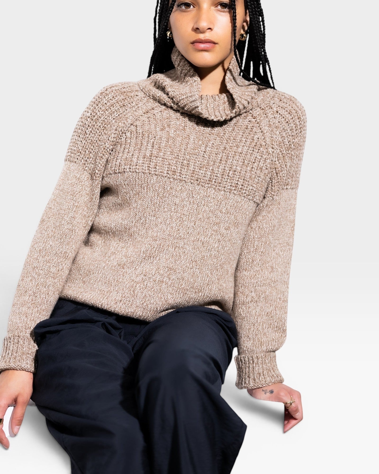 JONES + CO nutmeg turtleneck long sleeve sweater in baby alpaca and organic cotton with chunky rib details and ribbed cuffs.