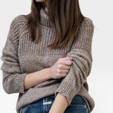 JONES + CO nutmeg turtleneck sweater in baby alpaca and organic cotton with chunky rib details and ribbed cuffs.