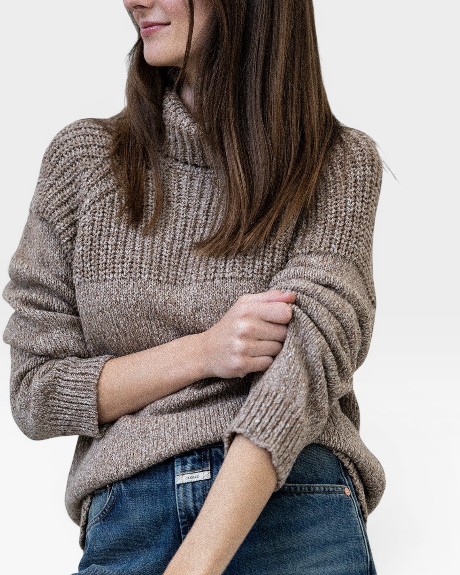 JONES + CO nutmeg turtleneck sweater in baby alpaca and organic cotton with chunky rib details and ribbed cuffs.