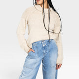JONES + CO oat turtleneck sweater in a light-weight alpaca and cotton knit with chunky shoulder rib details and ribbed cuffs.