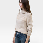 JONES + CO oat turtleneck sweater made from baby alpaca and cotton yarn with chunky rib details and ribbed cuffs.