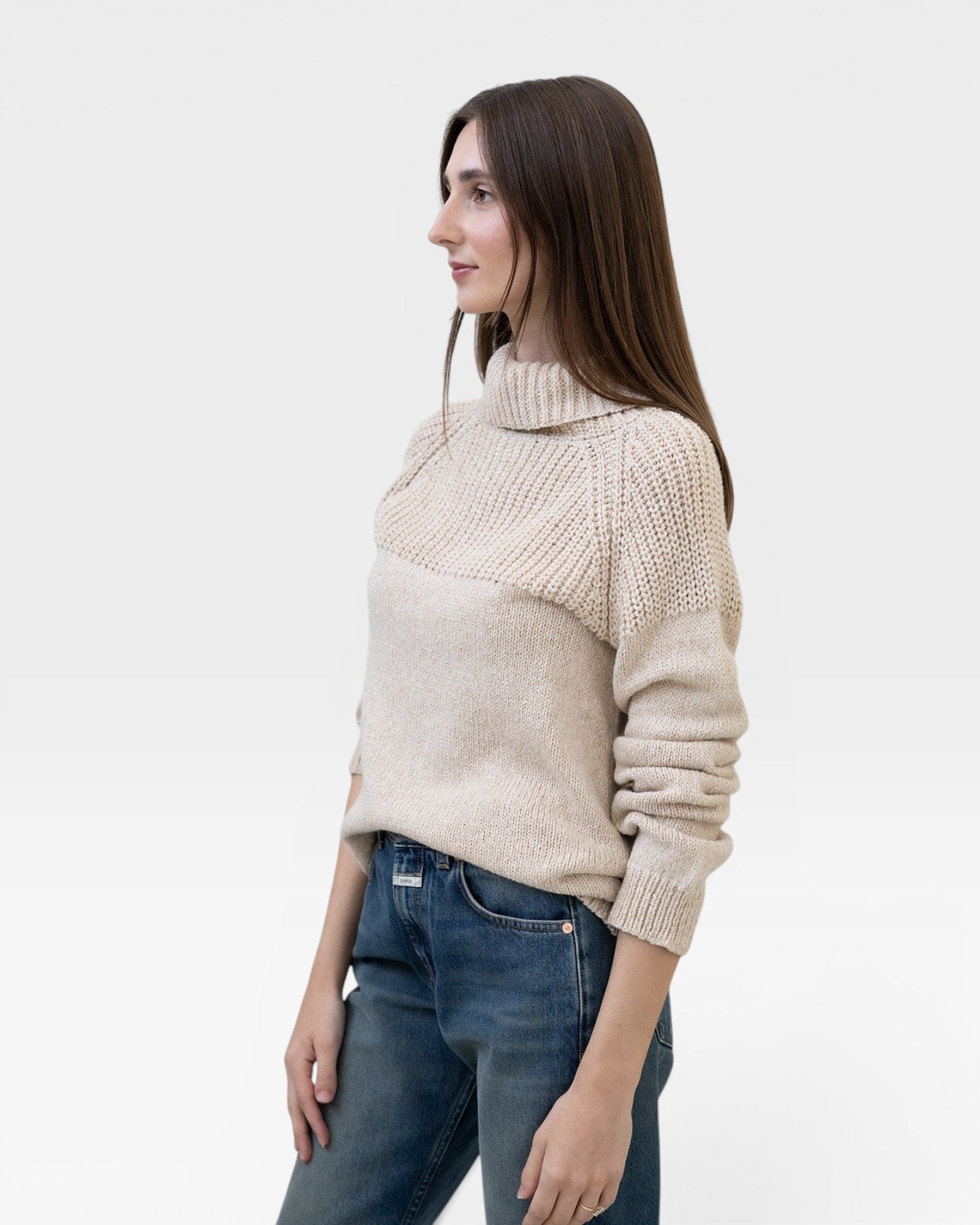 JONES + CO oat turtleneck sweater made from baby alpaca and cotton yarn with chunky rib details and ribbed cuffs.
