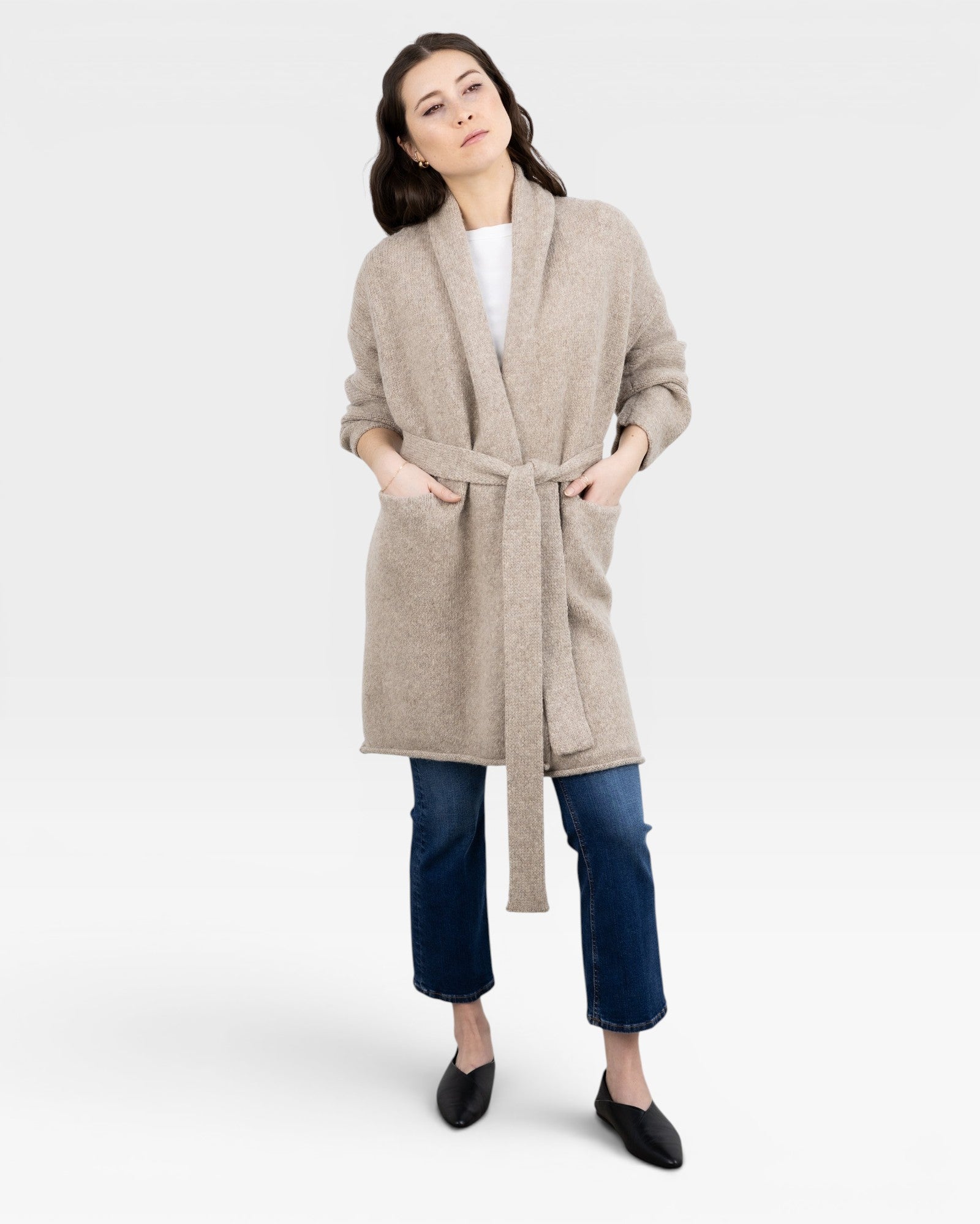 JONES + CO oatmeal alpaca wool blend Parker Sweater Coat with belt and pockets, worn by a woman.
