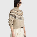 JONES + CO oatmeal mock neck sweater featuring a traditional fair isle knit pattern and ribbed trim details.