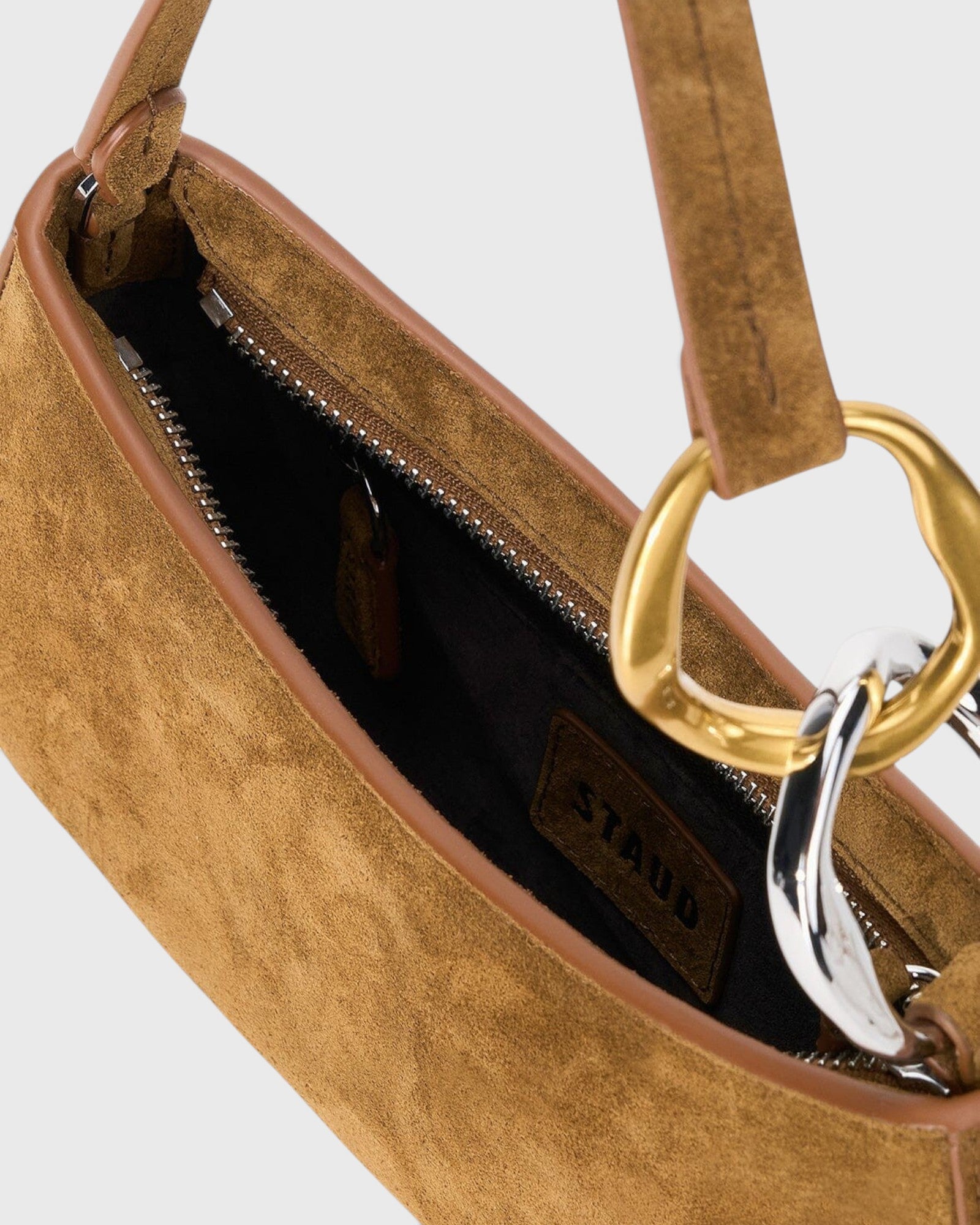 JONES + CO Ollie Bag in cigar tobacco suede with leather trim and signature two-tone gold and silver link hardware.