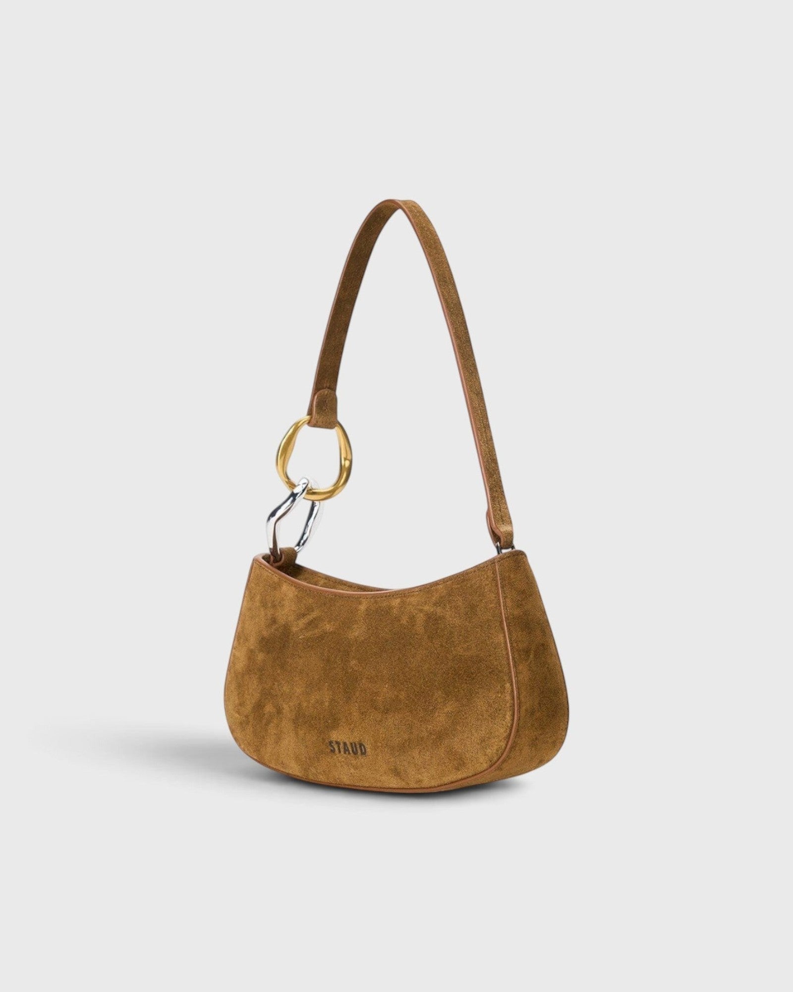 JONES + CO Ollie Bag in cigar brown suede with a crescent silhouette and mixed gold and silver link strap detail.