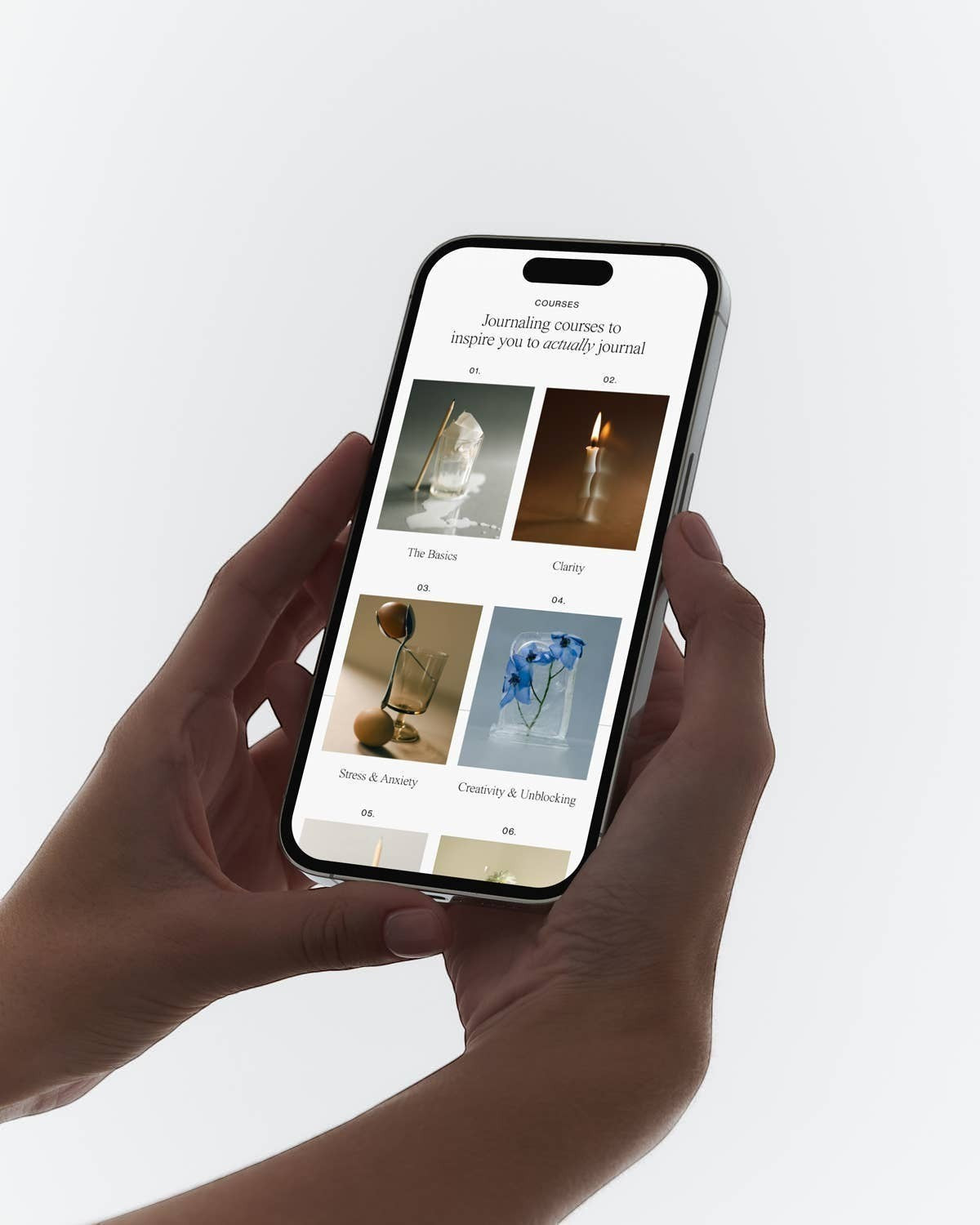 JONES + CO Open Journal digital course library displayed on a smartphone screen held in hands
