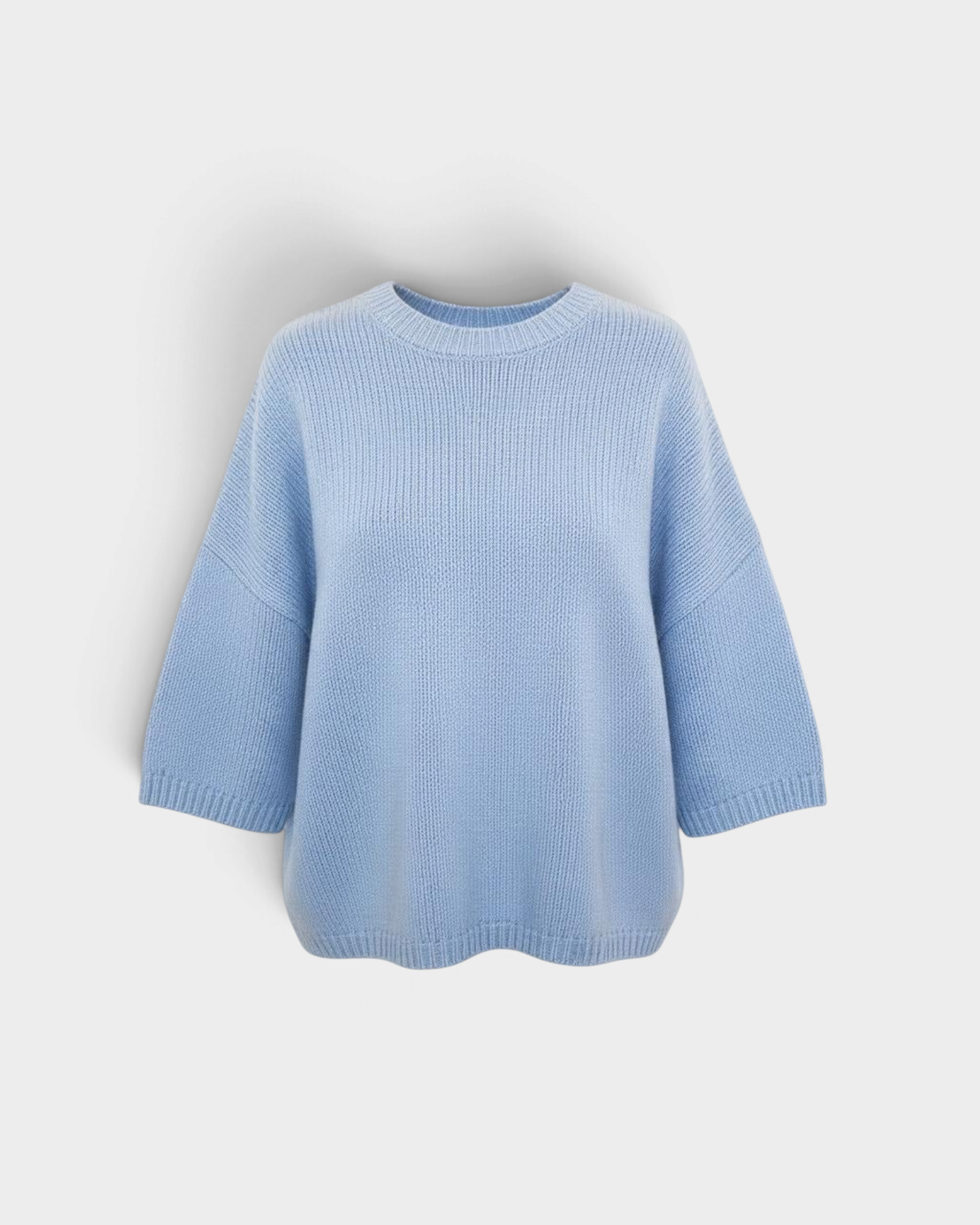 JONES + CO oversized crew-neck sweater in soft heathered blue with dropped shoulders and short sleeves