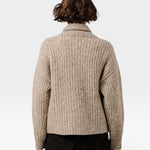 Back view of a JONES + CO oversized marble shawl cardigan in alpaca and cotton blend with dropped shoulders.