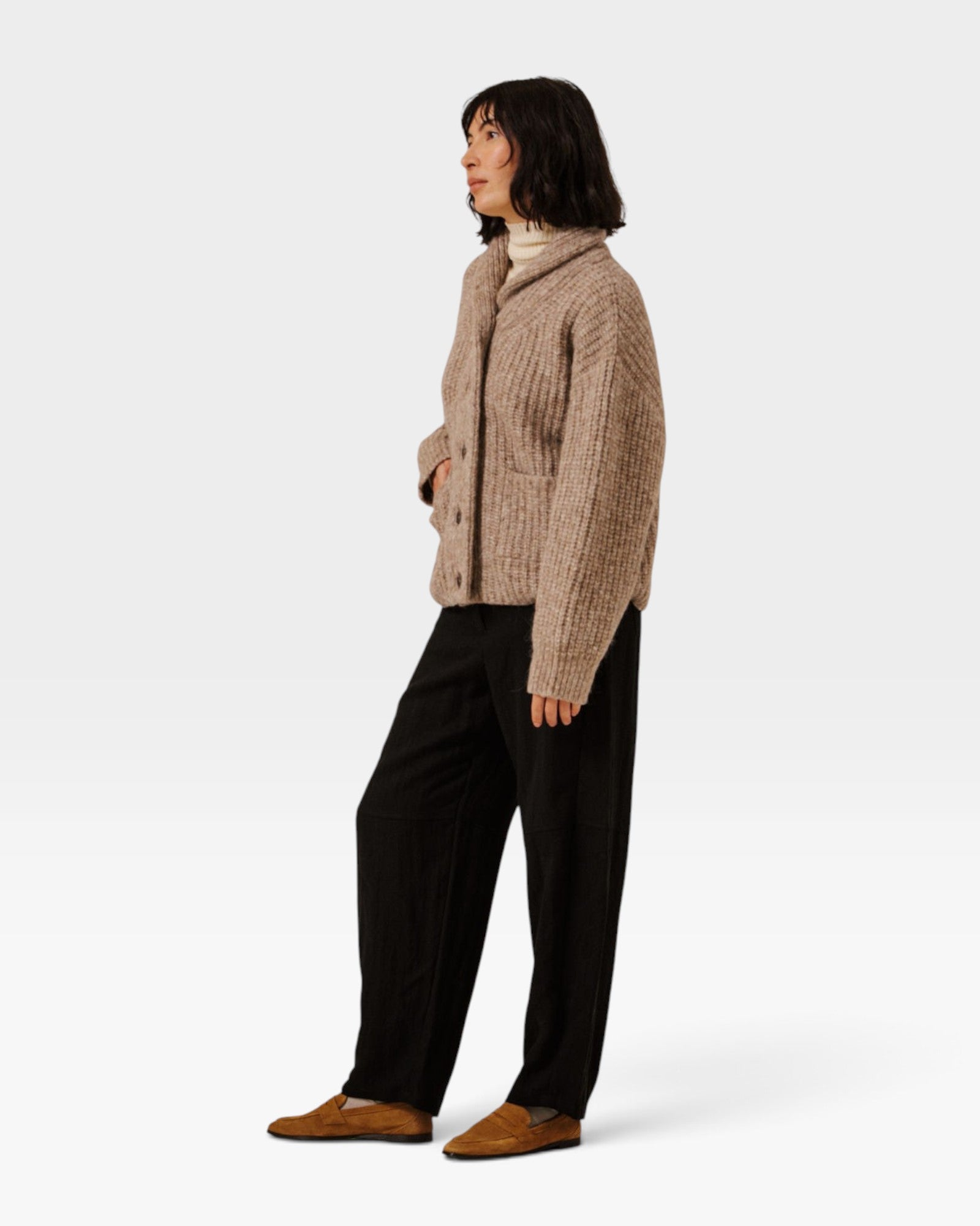 JONES + CO oversized shawl-collar cardigan in dark fawn alpaca cotton blend worn with black trousers and loafers.