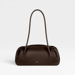 JONES + CO Oyster shoulder bag in espresso brown pebbled leather with a structured, elongated silhouette.