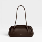 JONES + CO Oyster shoulder bag in espresso brown pebbled leather with a structured, elongated silhouette.