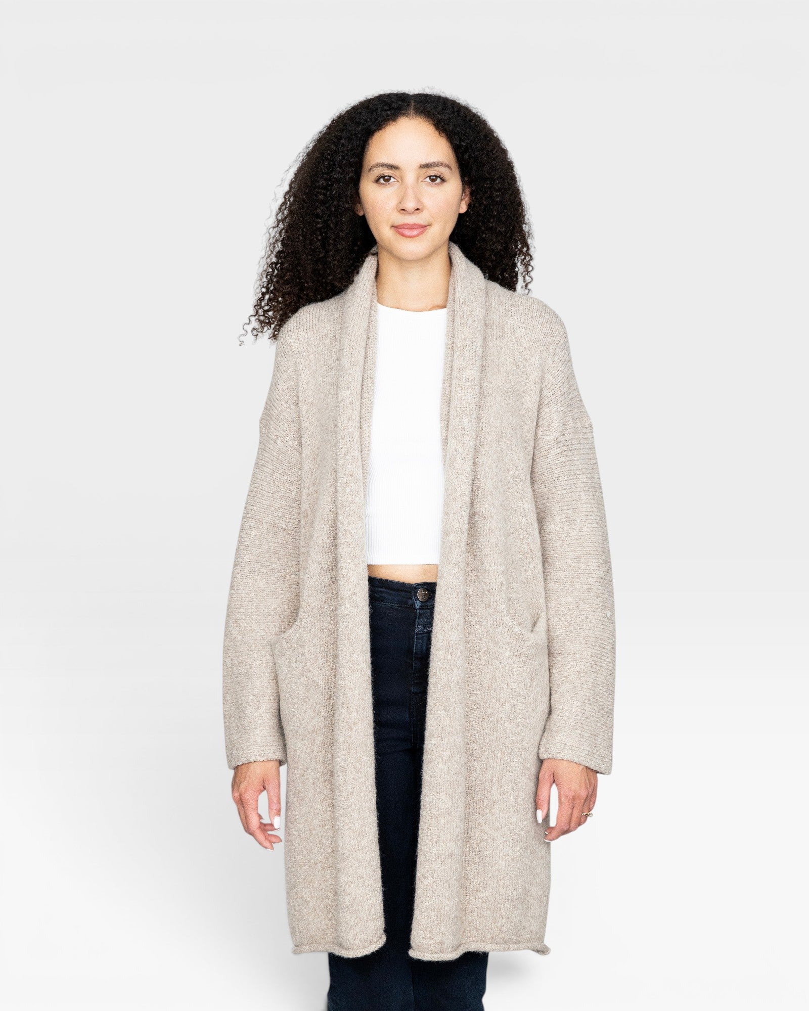 JONES + CO Parker Sweater Coat in oatmeal, a cozy alpaca wool blend with dropped shoulders and front pockets.