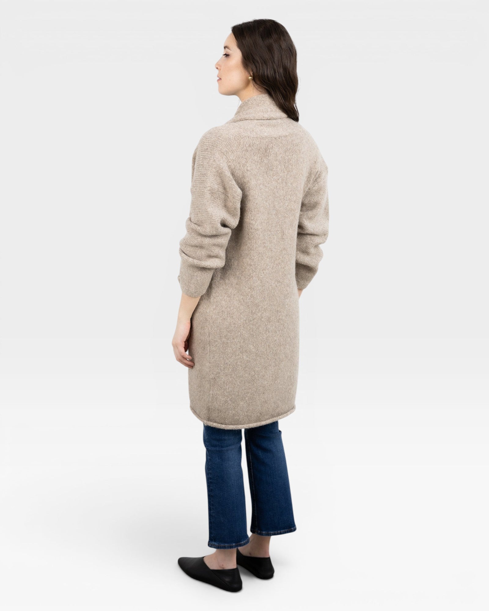 JONES + CO oatmeal alpaca wool blend Parker Sweater Coat with dropped shoulders and front pockets, worn by a model.