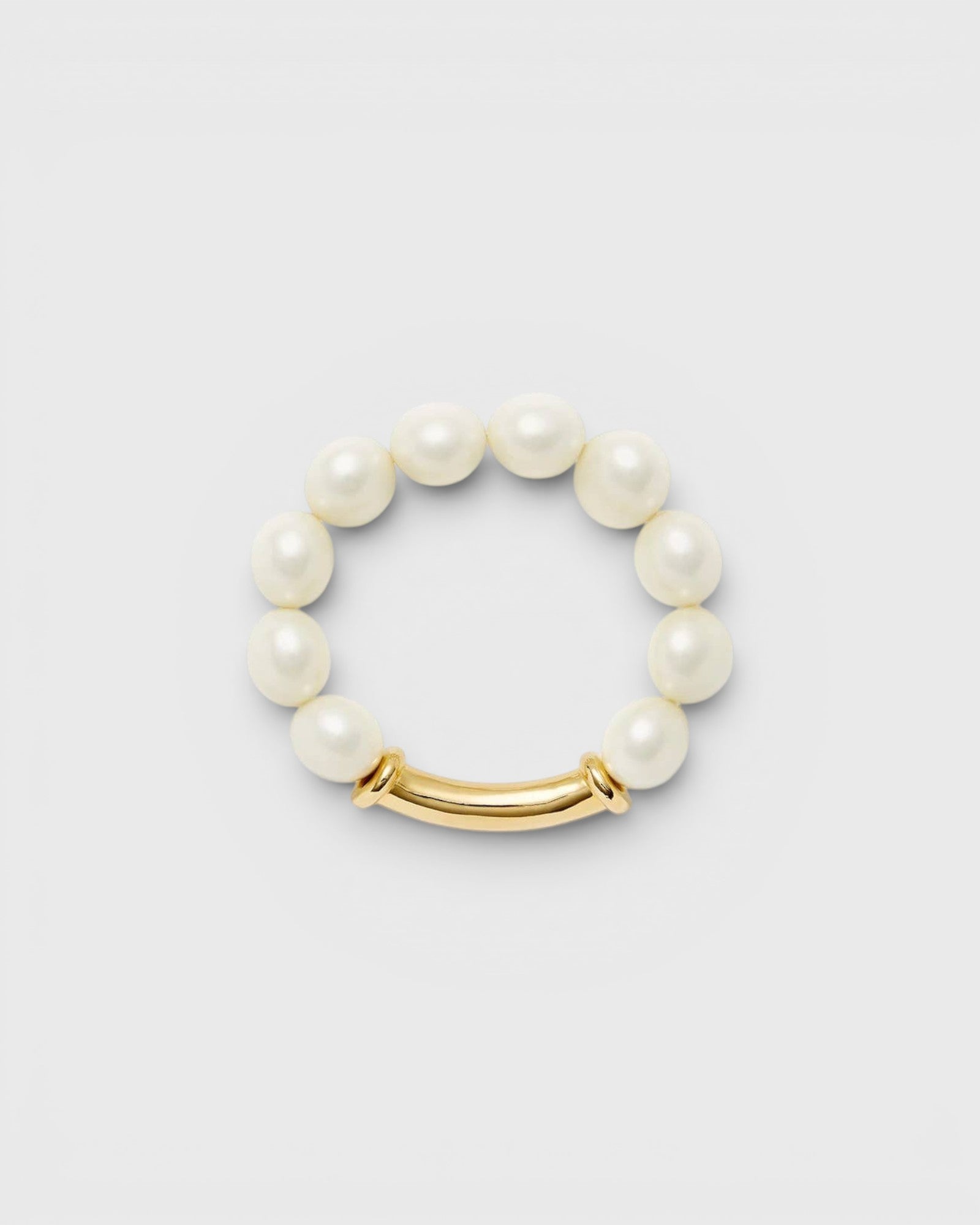 JONES + CO white pebble pearl stretch bracelet with polished 14k gold over brass elongated hardware.