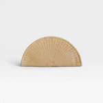JONES + CO Perla Clutch in caramel, a half-moon shaped bag made from handwoven basketweave leather with a wrap-around zip.