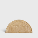 JONES + CO Perla Clutch in caramel, a half-moon shaped bag made from handwoven basketweave leather with a wrap-around zip.