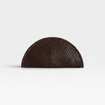 JONES + CO Perla Clutch in espresso brown basketweave leather, seashell-shaped with wrap-around zip.